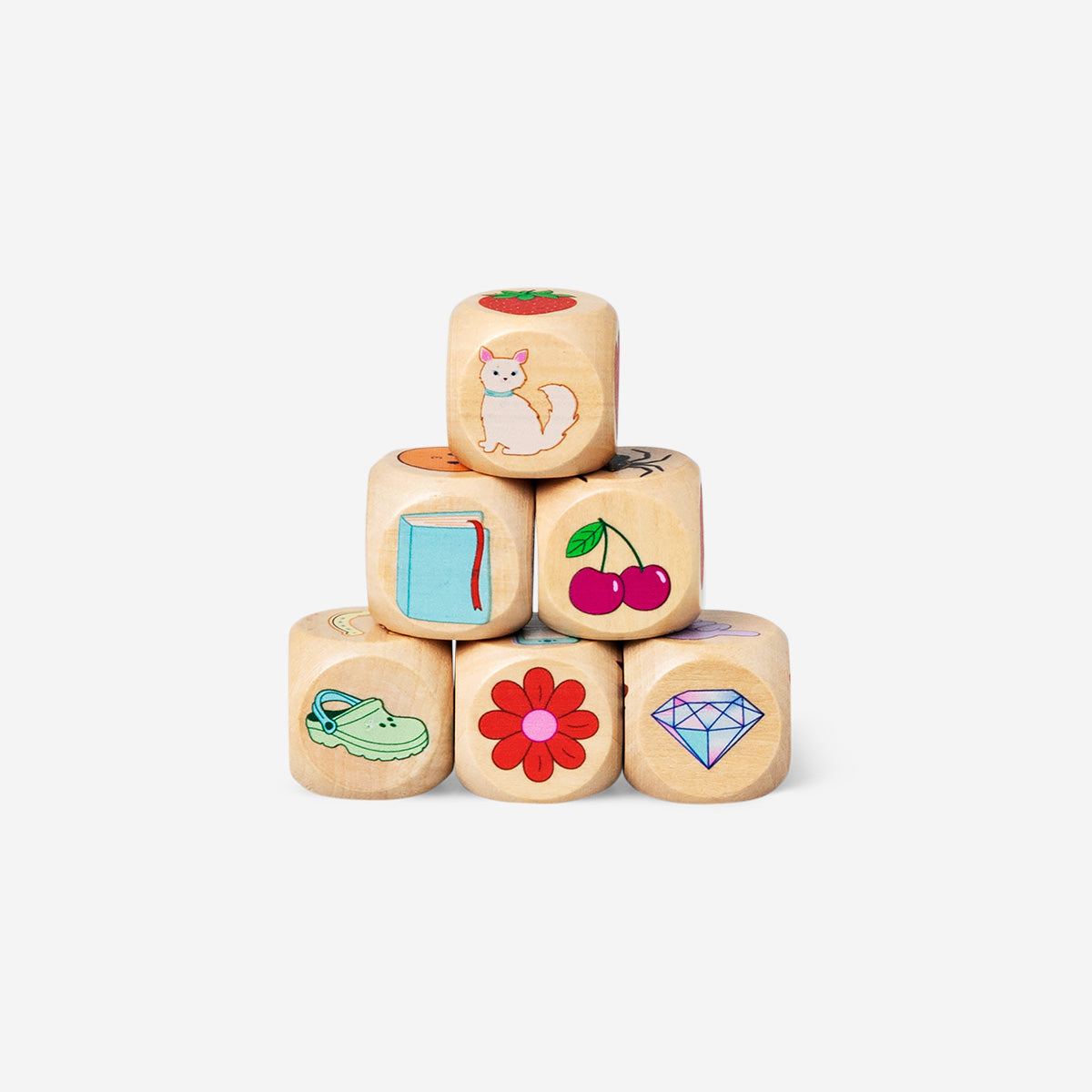 Flying Tiger Copenhagen Storyteller dice game with colorful numbered dice on a white background.