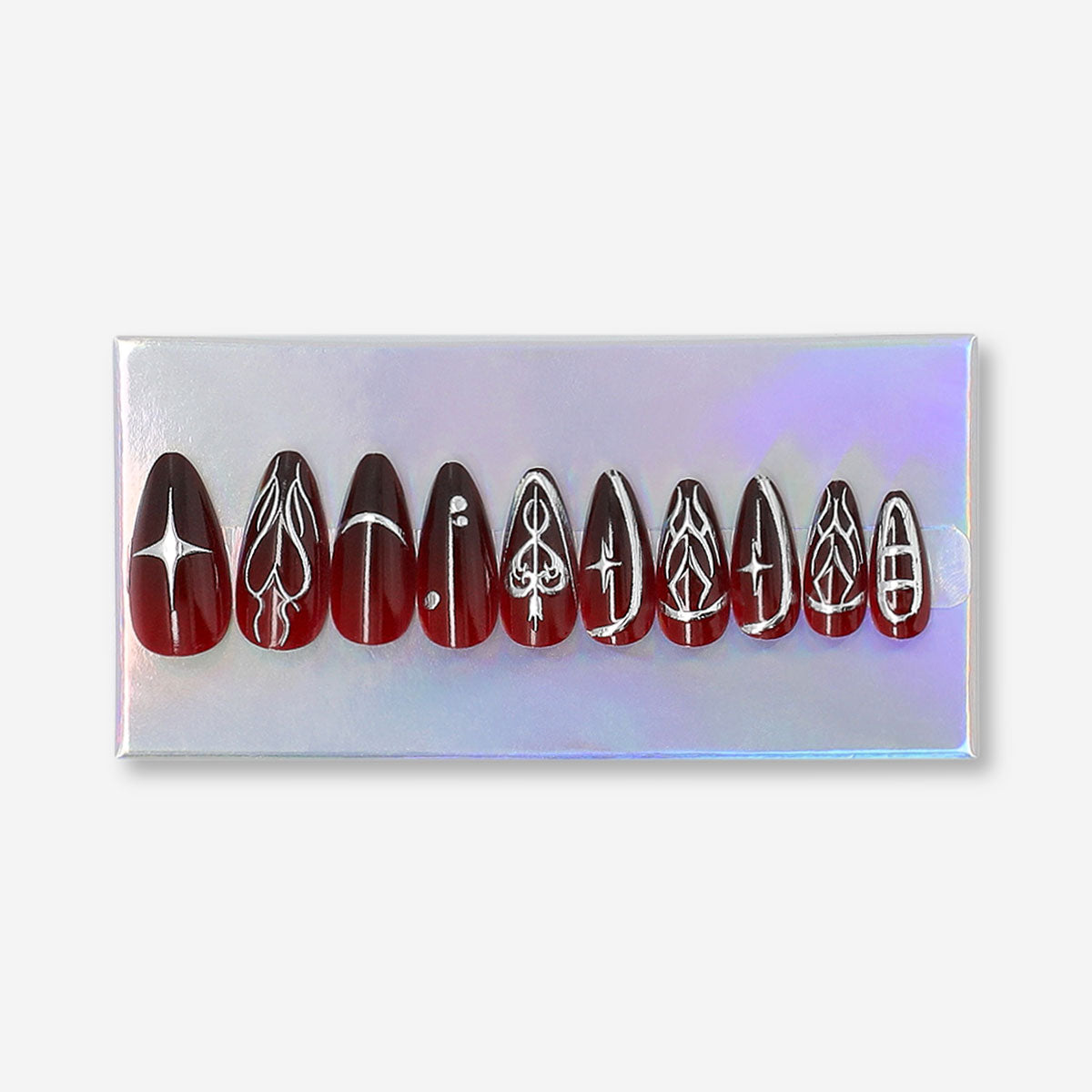 Red press-on nails with silver decorative design, from Flying Tiger Copenhagen, perfect for personal care and stylish nail accents.