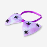 Iridescent kids' hairband with black spider decorations, perfect for Halloween or party costumes, by Flying Tiger Copenhagen.