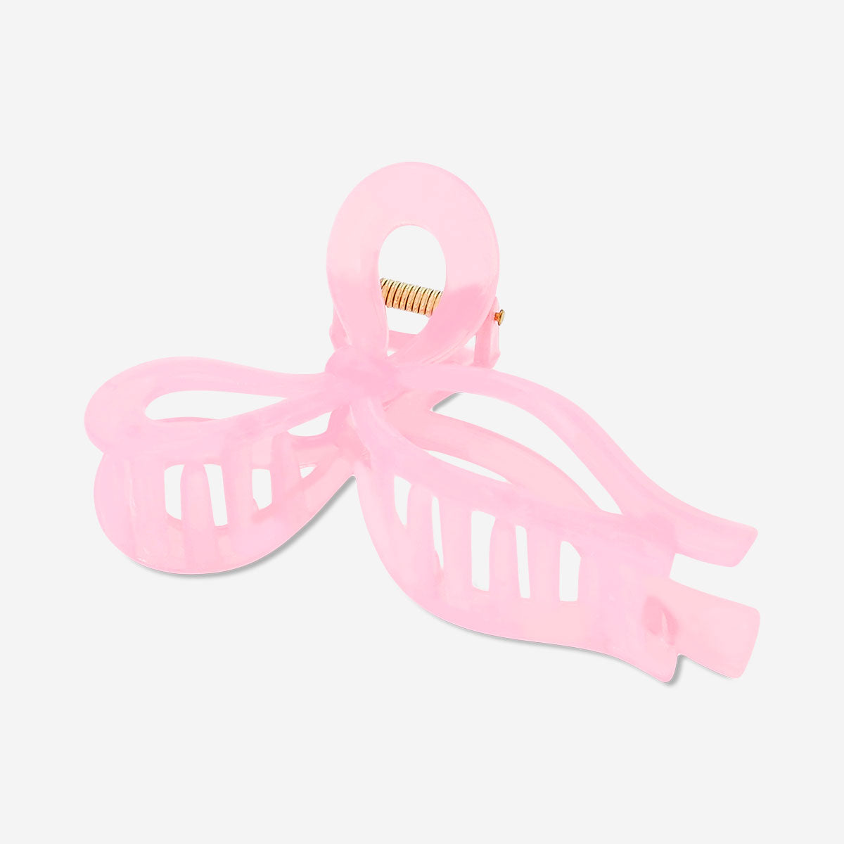 Pink textile bow hairclip with a large decorative bow, stylish accessory from Flying Tiger Copenhagen.