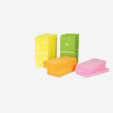 Oversized domino game by Flying Tiger Copenhagen featuring large black and white domino tiles on a grassy outdoor setting.