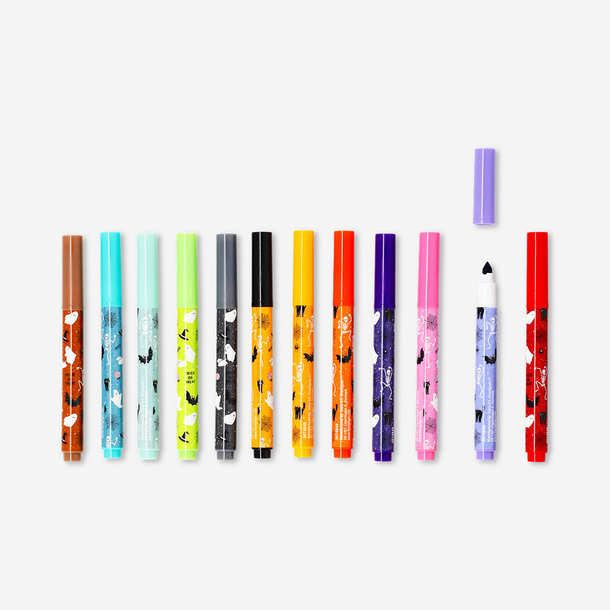 Set of 12 Halloween-themed office markers by Flying Tiger Copenhagen with orange and black ink for festive writing and drawing.