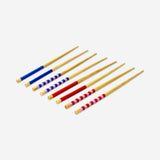 Colorful wooden chopsticks set with four pieces, ideal for kitchen use, by Flying Tiger Copenhagen.