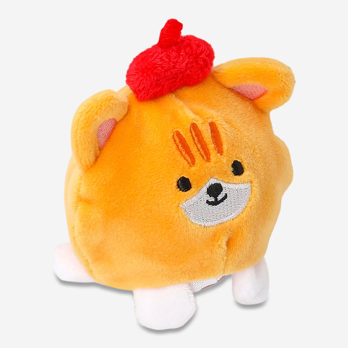 Press me toy featuring a cute tabby cat design, a playful gadget by Flying Tiger Copenhagen.