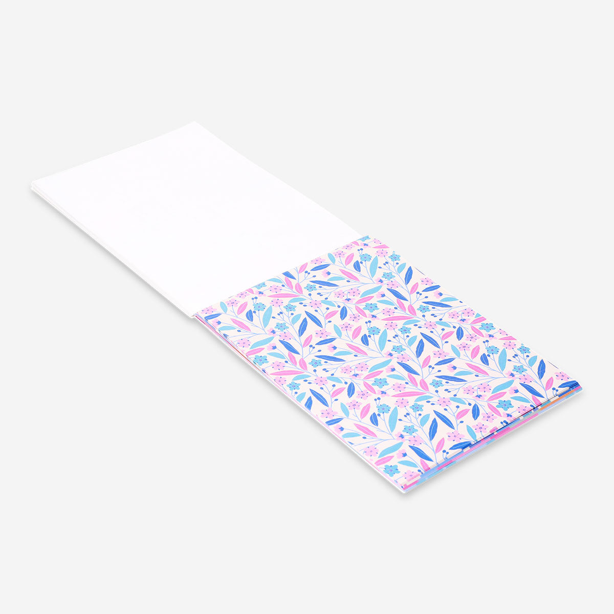 Decorative office paper with colorful stickers by Flying Tiger Copenhagen, featuring vibrant patterns and playful designs.
