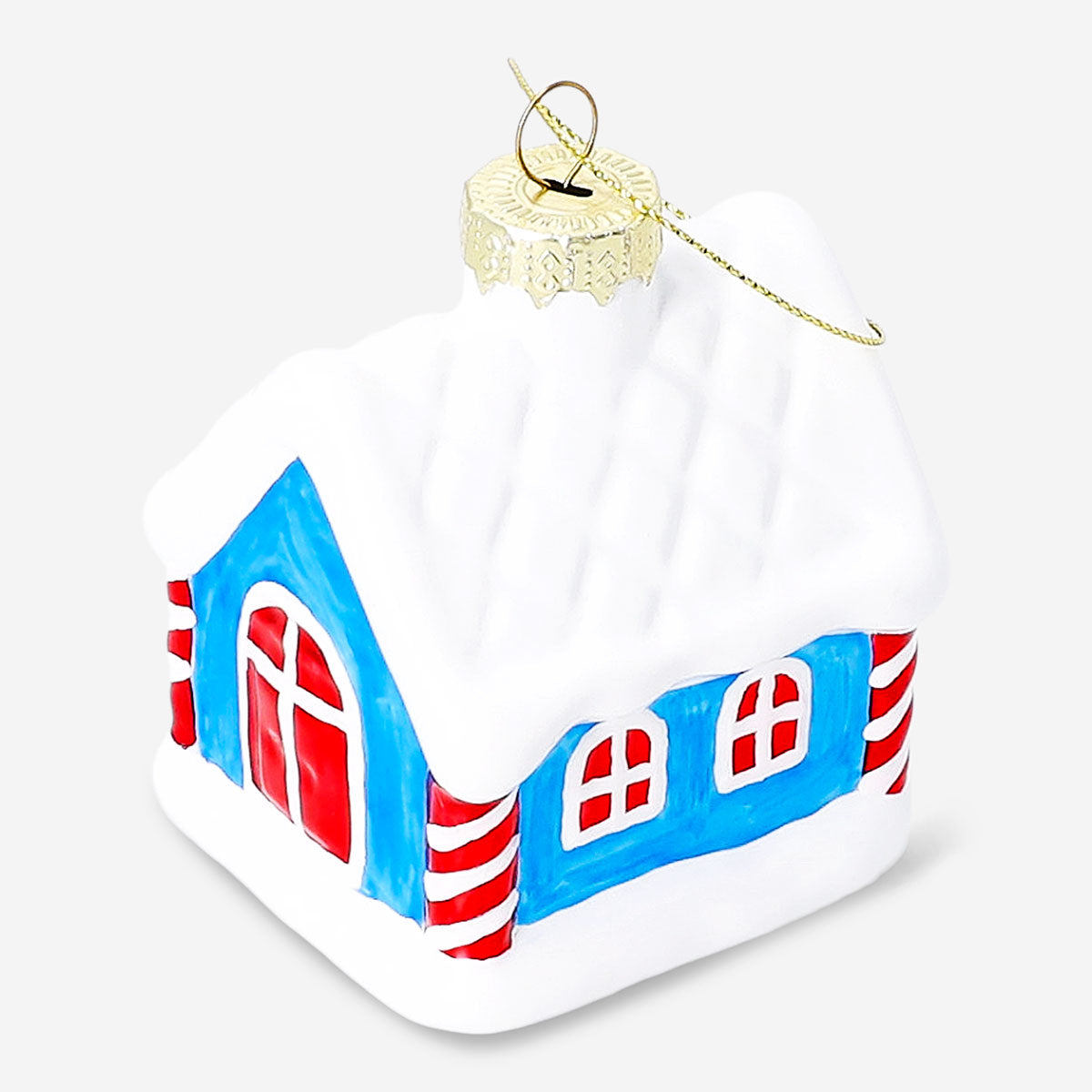 Snow-covered house ornament from Flying Tiger Copenhagen, detailed home decor with winter holiday theme.