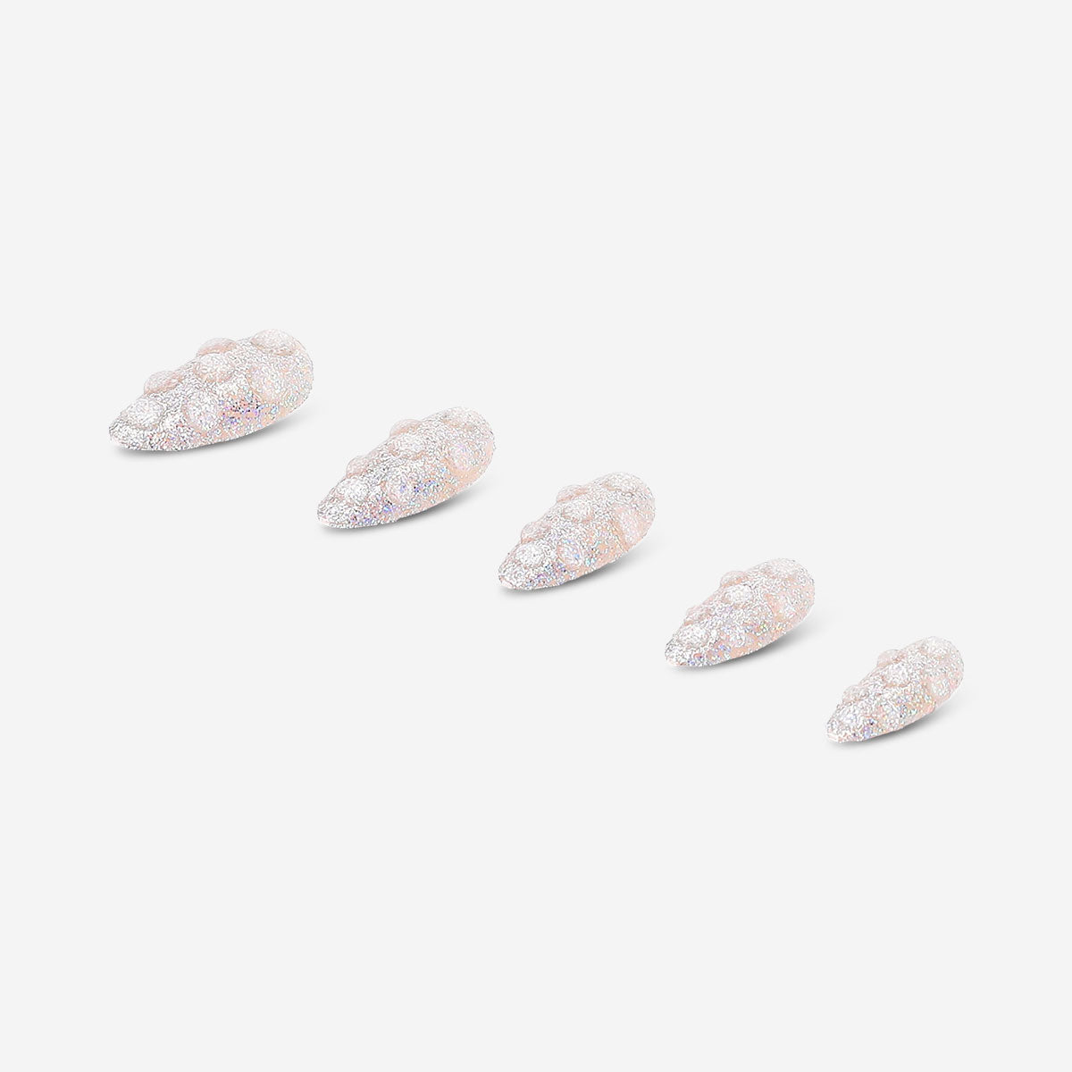 Silver glitter press-on nails from Flying Tiger Copenhagen, showcasing shiny, decorative nail tips for easy at-home manicures.