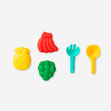 Six colorful fruit-themed sand toys set, including shovels and molds, for outdoor play by Flying Tiger Copenhagen.