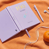 A6 Flying Tiger Copenhagen musical journal with a colorful cover and lined pages, designed for writing and note-taking.