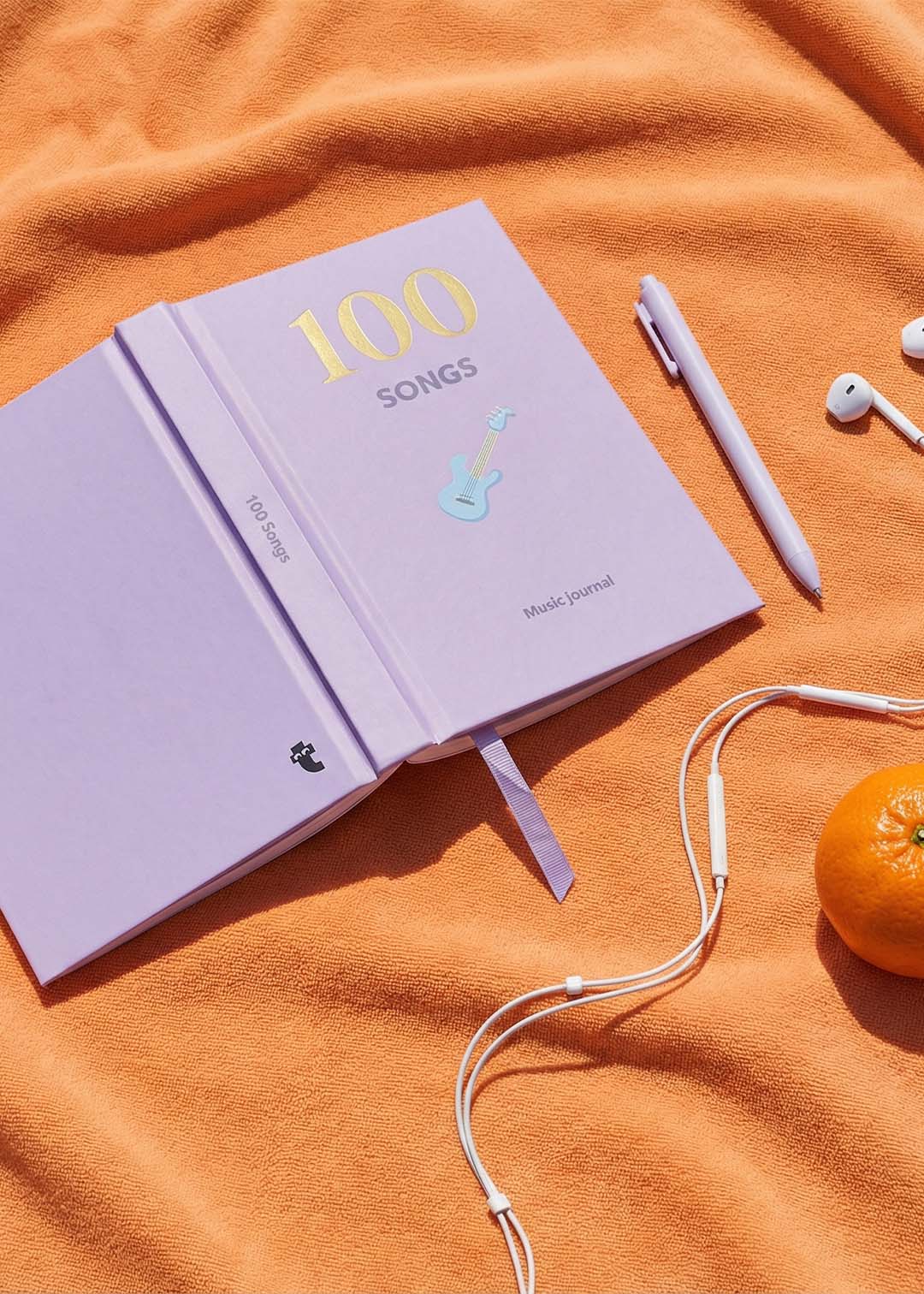 A6 Flying Tiger Copenhagen musical journal with a colorful cover and lined pages, designed for writing and note-taking.