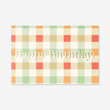 Office birthday card with checkered pattern from Flying Tiger Copenhagen, featuring colorful geometric designs.