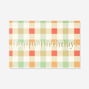 Office birthday card with checkered pattern from Flying Tiger Copenhagen, featuring colorful geometric designs.