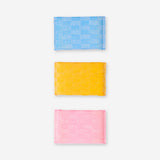 Set of three kitchen cleaning sponges from Flying Tiger Copenhagen with colorful, textured surfaces for dishwashing and cleaning.