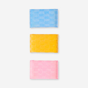 Set of three kitchen cleaning sponges from Flying Tiger Copenhagen with colorful, textured surfaces for dishwashing and cleaning.