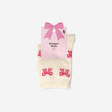 Textile socks with bows in size 36/38 from Flying Tiger Copenhagen, featuring a colorful and playful design.