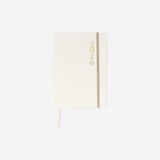 A5 Linen daily diary 2026 by Flying Tiger Copenhagen, open to pages with date and weekly layout, in soft linen cover.