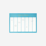 Flying Tiger Copenhagen weekly planner with tear-off pages, featuring a clean office design and English layout for organized planning.