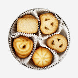 Flying Tiger Copenhagen butter cookies in a decorative tin box, showcasing golden, buttery cookies inside a stylish food container.