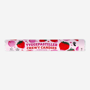 Strawberry-flavored chewy candy roll from Flying Tiger Copenhagen, showcasing vibrant pink and red fruit flavors in a close-up.