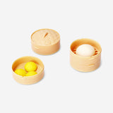 Candy dumplings in steamer basket