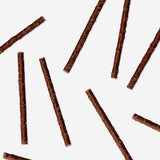Chocolate sticks with popping candy by Flying Tiger Copenhagen, showing crispy chocolate treats with colorful popping candy pieces.