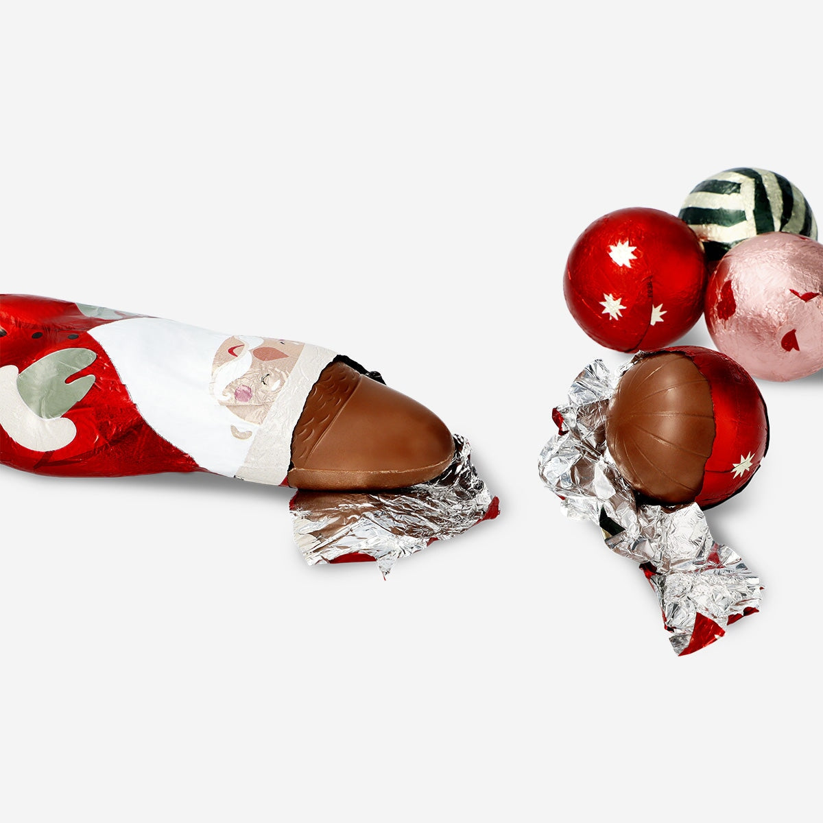 Assorted Christmas chocolates in a bag from Flying Tiger Copenhagen, festive holiday treats with colorful wrappers.