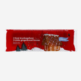 Three mini gingerbread houses for DIY decoration by Flying Tiger Copenhagen, featuring colorful icing and candy accents.