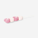 Strawberry-flavored marshmallow hearts on a stick from Flying Tiger Copenhagen, soft pink sweets with heart-shaped design.