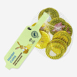 Milk chocolate coins from Flying Tiger Copenhagen, wrapped in gold foil, arranged in a pile on a white background.