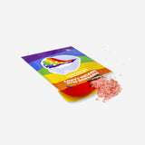Rainbow strawberry popping candy from Flying Tiger Copenhagen, showing colorful, crunchy candy pieces in a close-up image.
