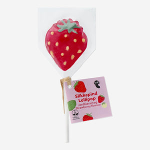 Strawberry-flavored Flying Tiger Copenhagen lollipop with a bright red strawberry design on the wrapper.
