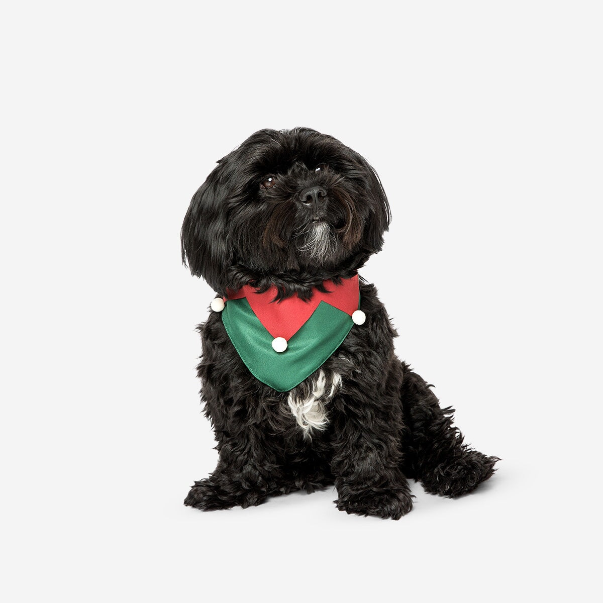 Flying Tiger Copenhagen Christmas pet bandana, festive red and green fabric with holiday patterns for pets.