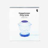 Color-changing diamond-shaped lamp by Flying Tiger Copenhagen, illuminated with vibrant shifting LED lights, stylish gadget decor.