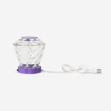 Color-changing diamond-shaped lamp by Flying Tiger Copenhagen, a stylish gadget with vibrant LED light display.
