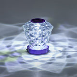 Color-changing diamond-shaped lamp by Flying Tiger Copenhagen, a stylish gadget with vibrant light effects.