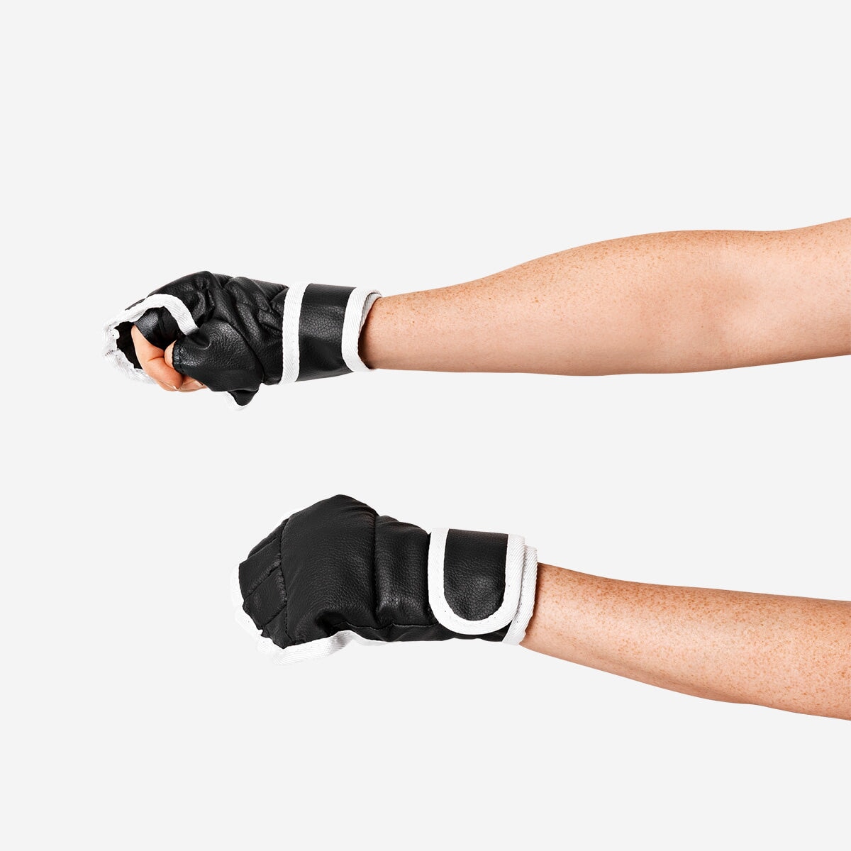 Electronic boxing pad gadget by Flying Tiger Copenhagen, showing a sleek digital boxing training device with buttons and display screen.