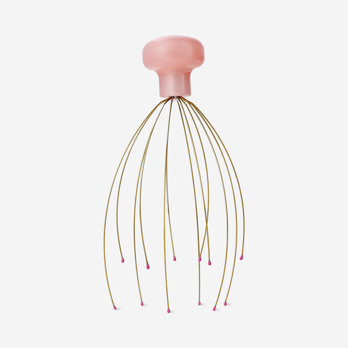 Gold head massager gadget by Flying Tiger Copenhagen, featuring a sleek design with multiple massaging nodes for scalp relaxation.