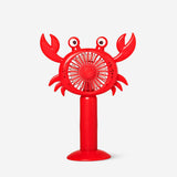 Rechargeable handheld crab fan gadget by Flying Tiger Copenhagen, featuring a cute crab design and portable cooling function.