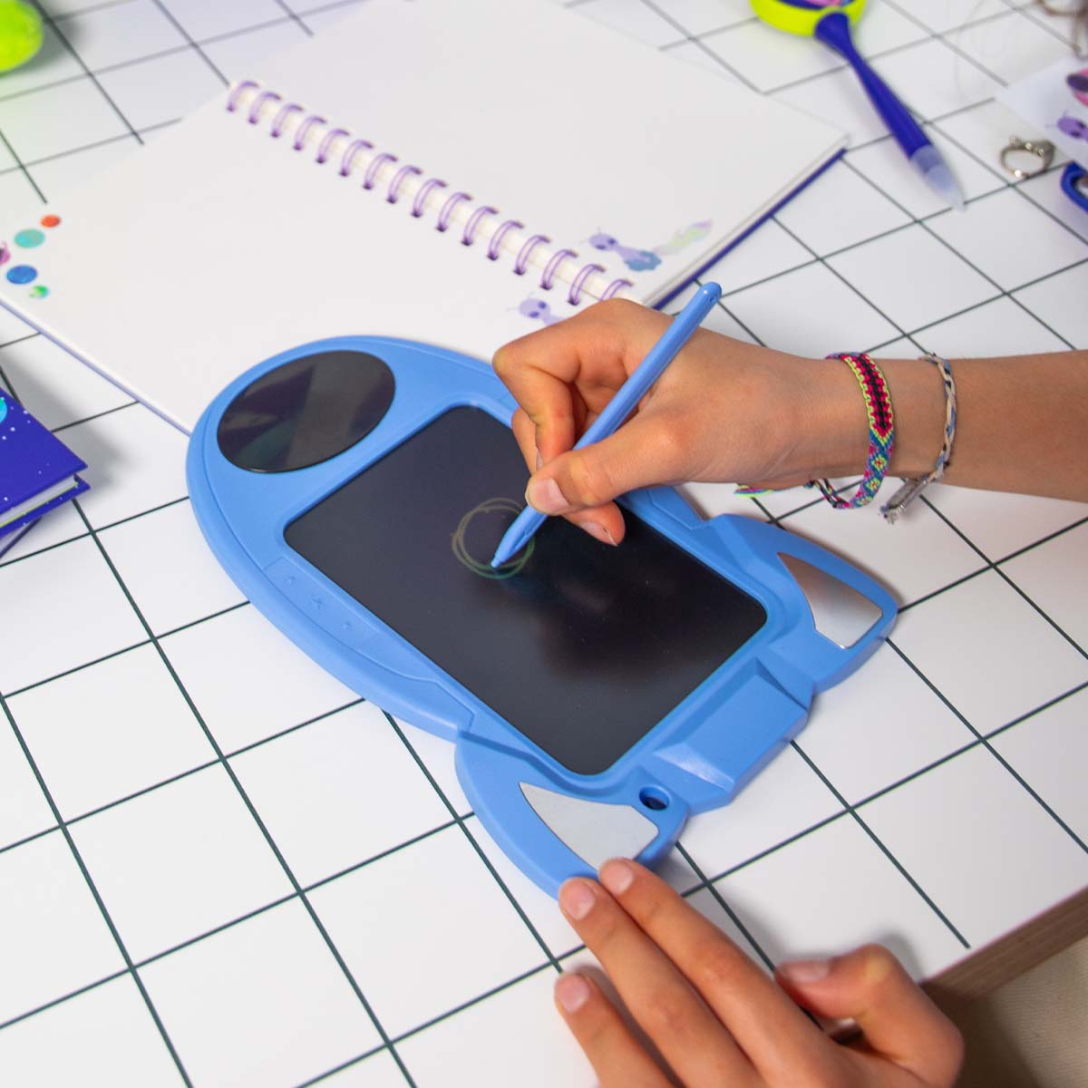 Flying Tiger Copenhagen magic drawing board gadget with a colorful screen and drawing surface, perfect for creative fun.