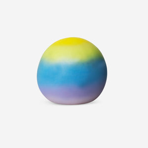 Multi-colored fidget ball gadget by Flying Tiger Copenhagen with vibrant, interconnected plastic segments for stress relief and fun.