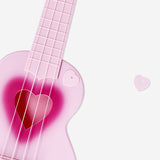 Pink ukulele with heart cut out