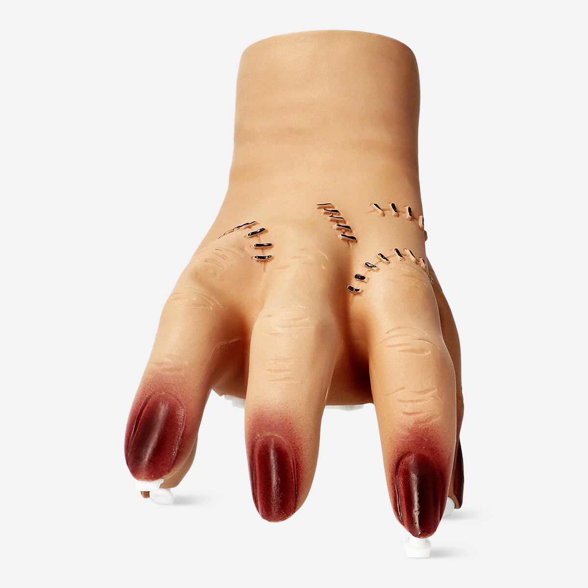 Flying Tiger Copenhagen walking hand gadget with sound, novelty hand-shaped device for fun gestures and sound effects.