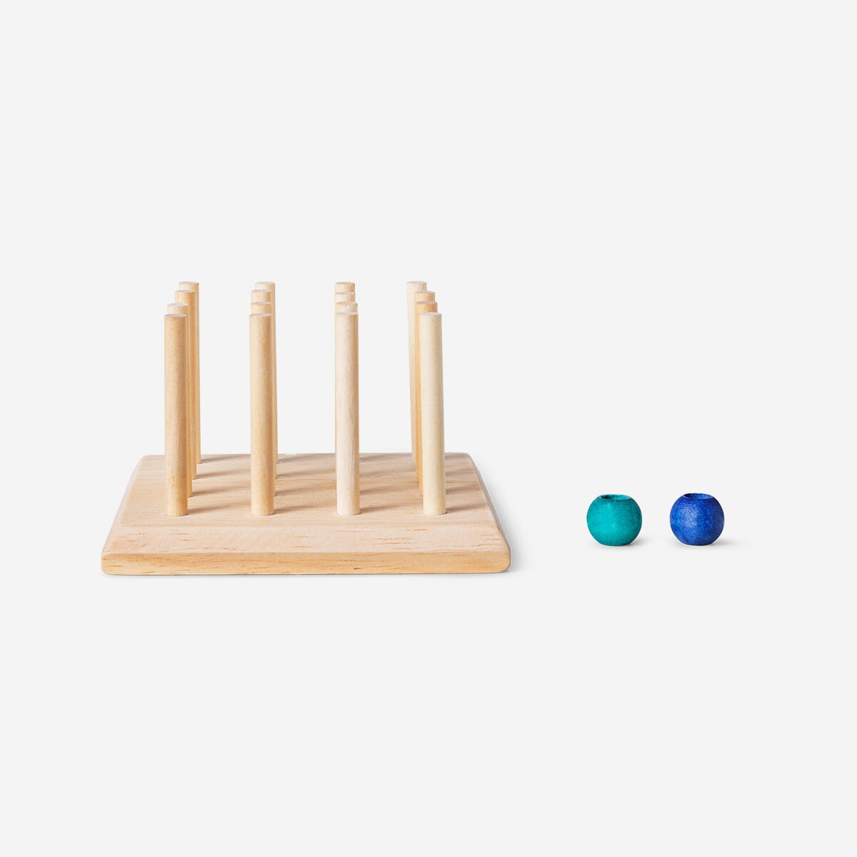 Flying Tiger Copenhagen 3D four-in-a-row game with colorful plastic pieces on a wooden surface, fun strategy game for all ages.