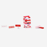 Flying Tiger Copenhagen stacking tower game with Valentine's messages, colorful wooden blocks for fun and romantic play.
