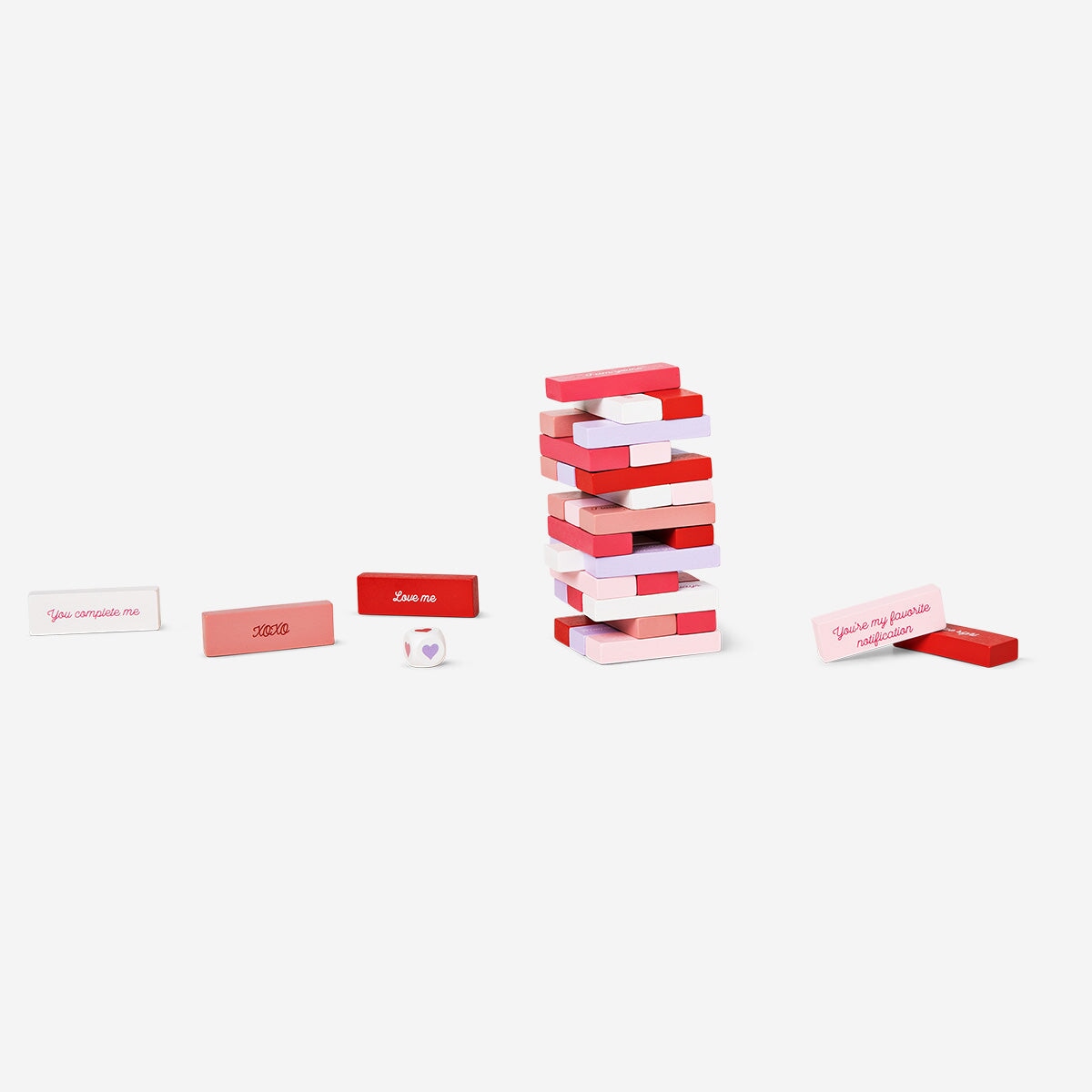Flying Tiger Copenhagen stacking tower game with Valentine's messages, colorful wooden blocks for fun and romantic play.