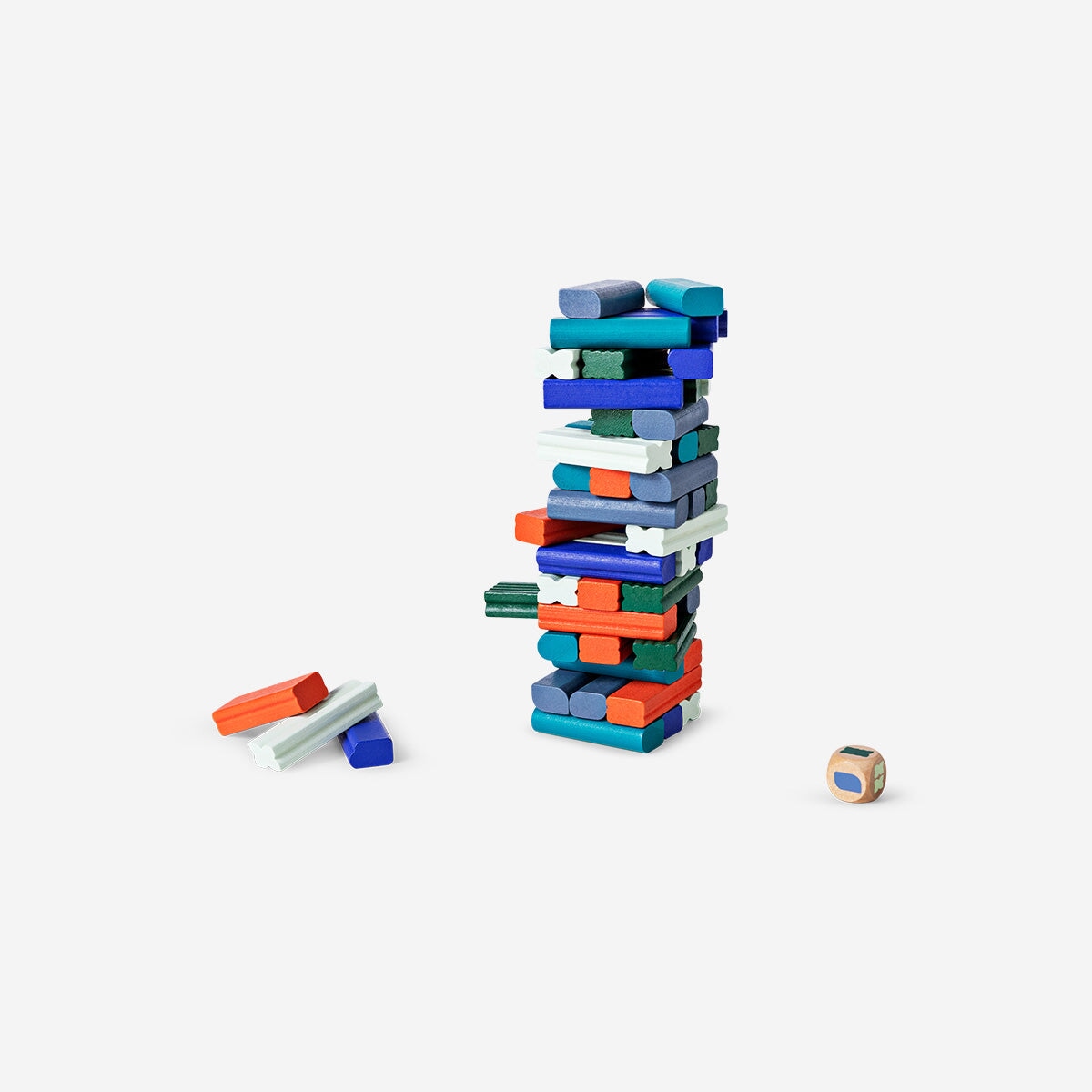 Wooden stacking tower game by Flying Tiger Copenhagen featuring colorful, interlocking blocks for fun and skill development.