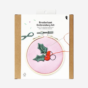 Christmas embroidery kit from Flying Tiger Copenhagen with three stencils, featuring colorful thread and fabric for festive craft projects.