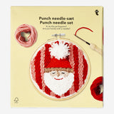 Christmas punch needle set by Flying Tiger Copenhagen, hobby craft kit with colorful needles and fabric for festive embroidery.