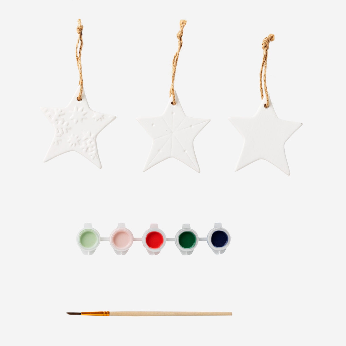 DIY ceramic star ornaments for hobby crafting, by Flying Tiger Copenhagen, featuring white ceramic stars ready for decoration.