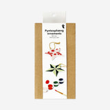 DIY ceramic star ornaments from Flying Tiger Copenhagen, hobby craft with white glazed ceramic stars for decorating or painting.